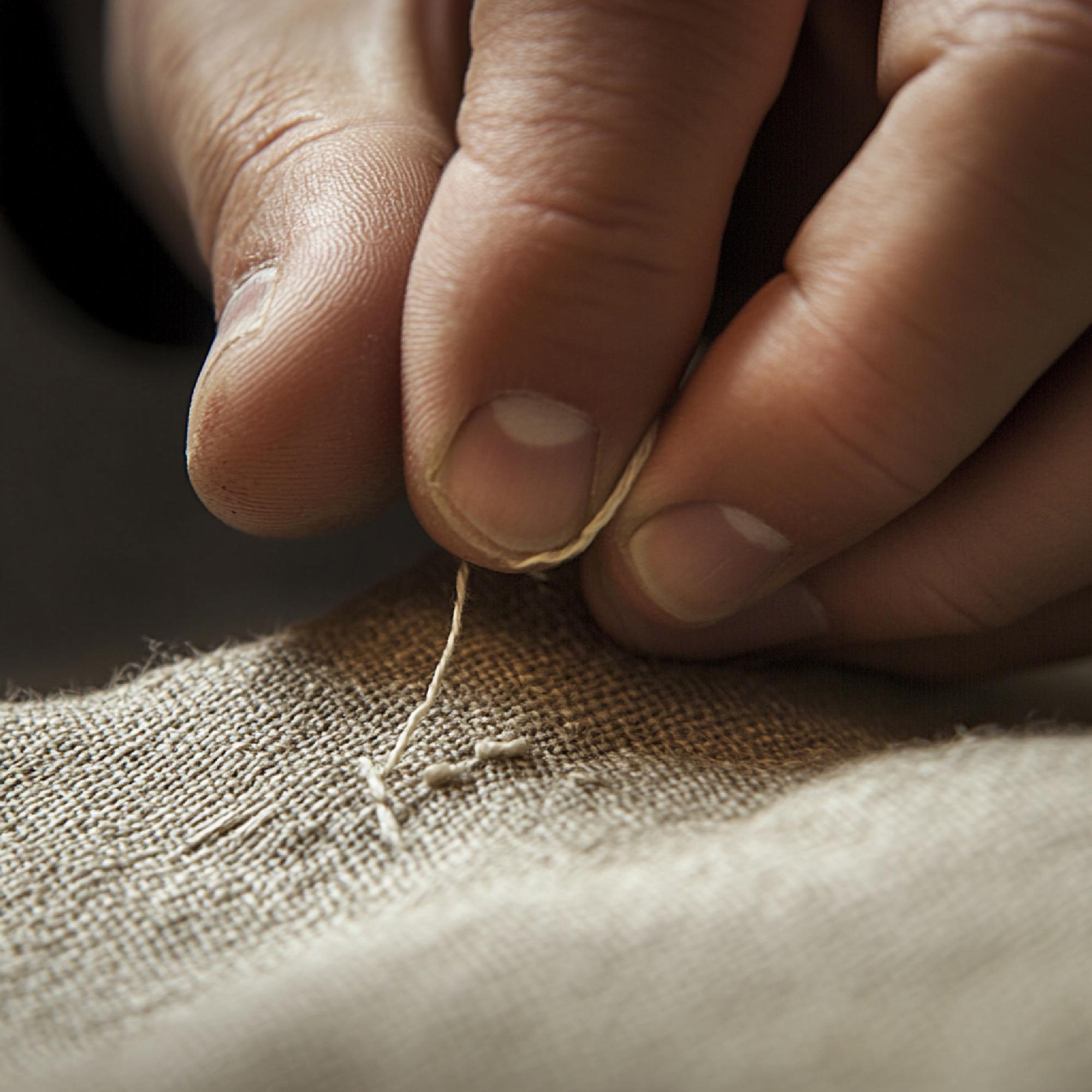 Close-up of artisanal embroidery on linen